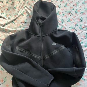 Medium/large sized Nike tech black slightly used